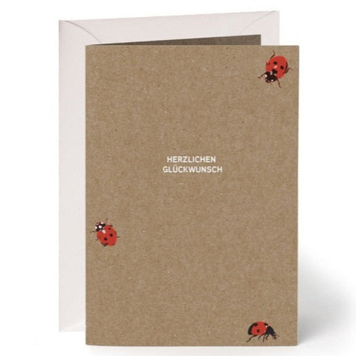 Grusskarte aus Muskatpapier mit weissem Druck "Herzlichen Glückwunsch"